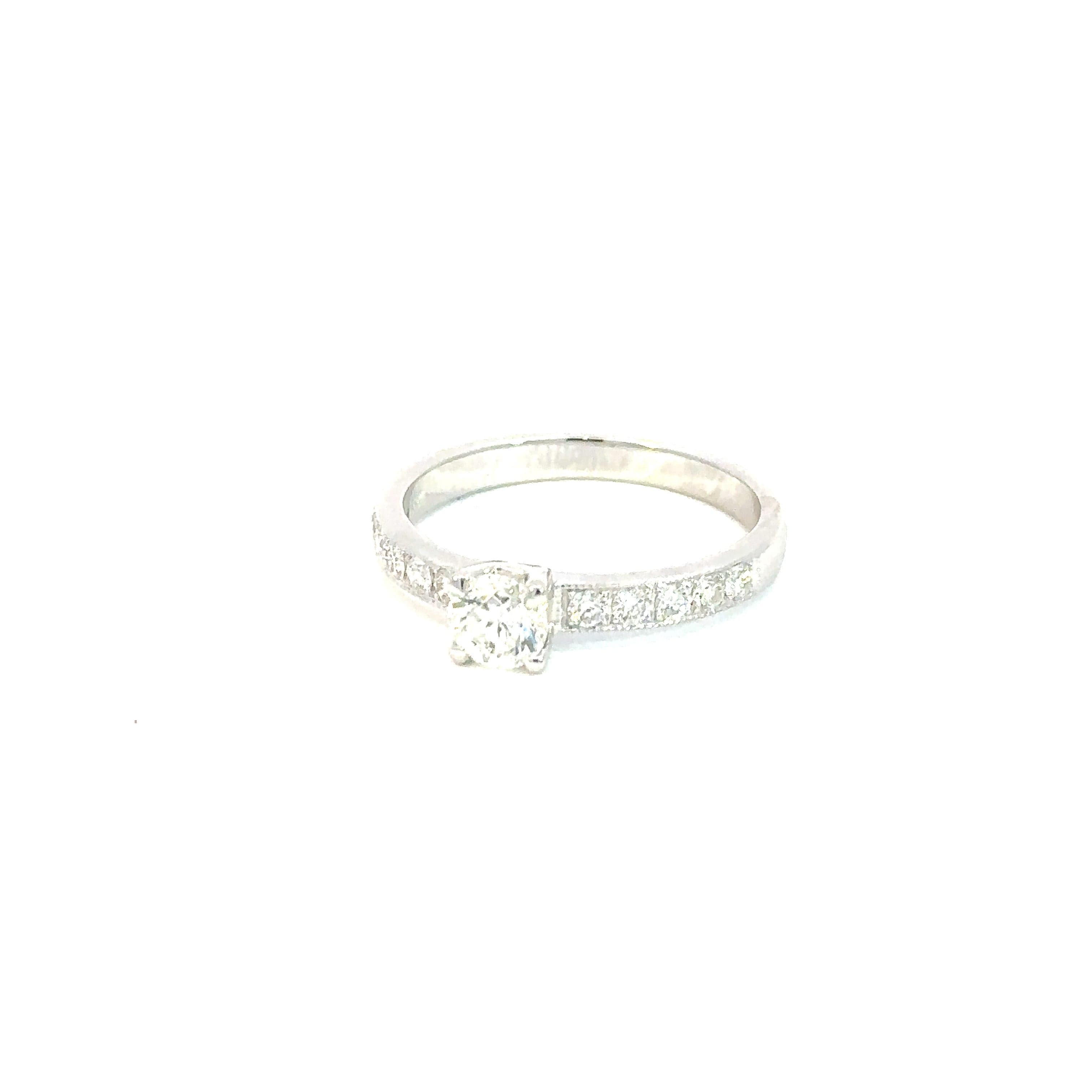 Ring 18KWGOLD s/w Round Diamond &small diamond